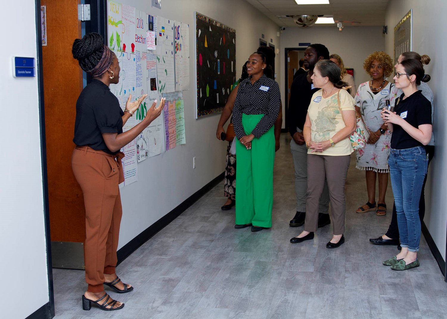 Community members tour the renovated Pace Jacksonville center that supports middle- and high-school girls in North Florida.